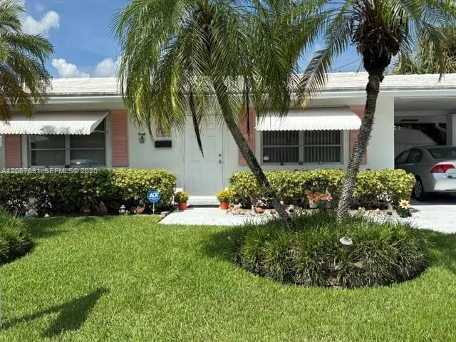 Foto de propiedad en 5405 NW 23rd Terrace, Tamarac, FL 33309 Tamarac con MLS# 