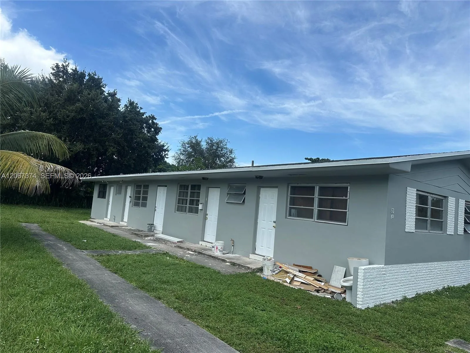 Foto de propiedad en 55 NW 169th Street 55, North Miami Beach, FL 33169 North Miami Beach con MLS# 
