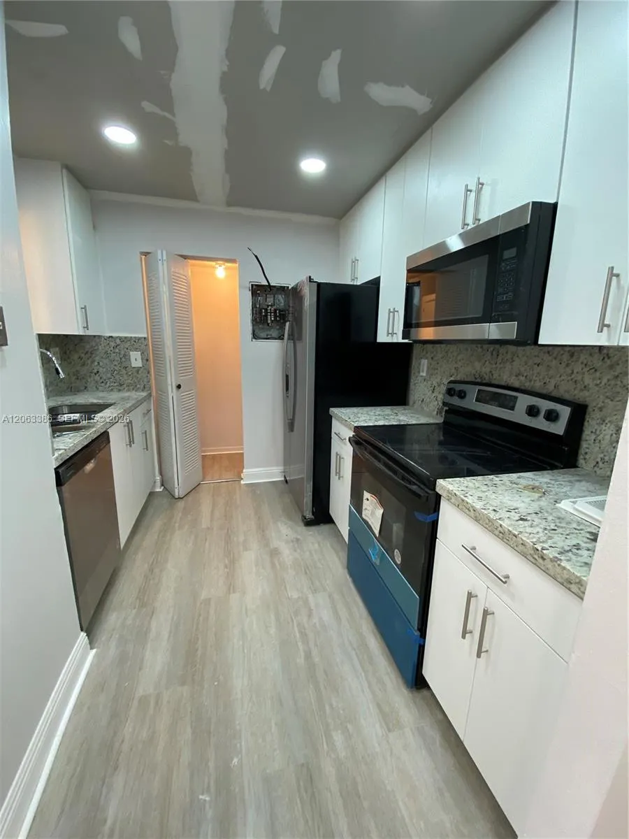 Foto de propiedad en 556 NW 114th Avenue 203, Sweetwater, FL 33172 Sweetwater con MLS# 