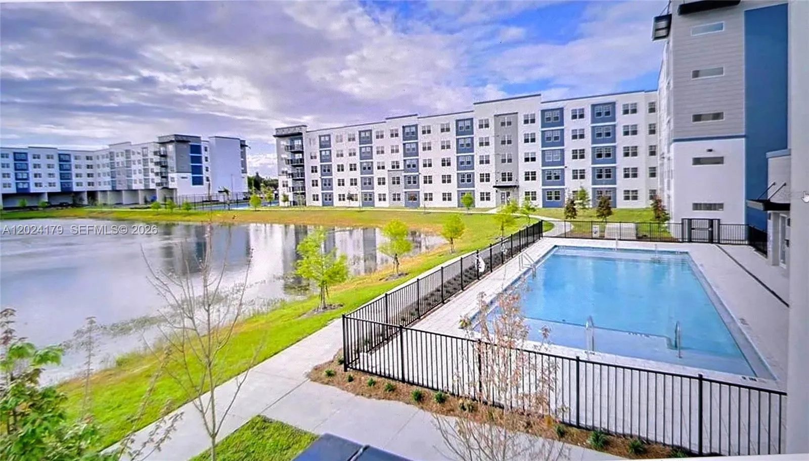 Foto de propiedad en 5579 Millenia Park Boulevard 211, Orlando, FL 32839 Orlando con MLS# 