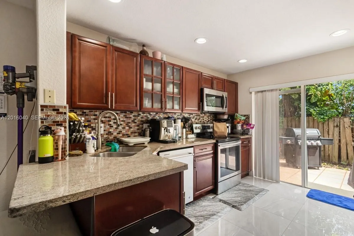 Foto de propiedad en 5605 NW 109th Avenue 71, Doral, FL 33178 Doral con MLS# 