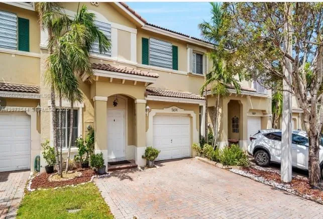 Foto de propiedad en 5614 NW 112th Place, Doral, FL 33178 Doral con MLS# 