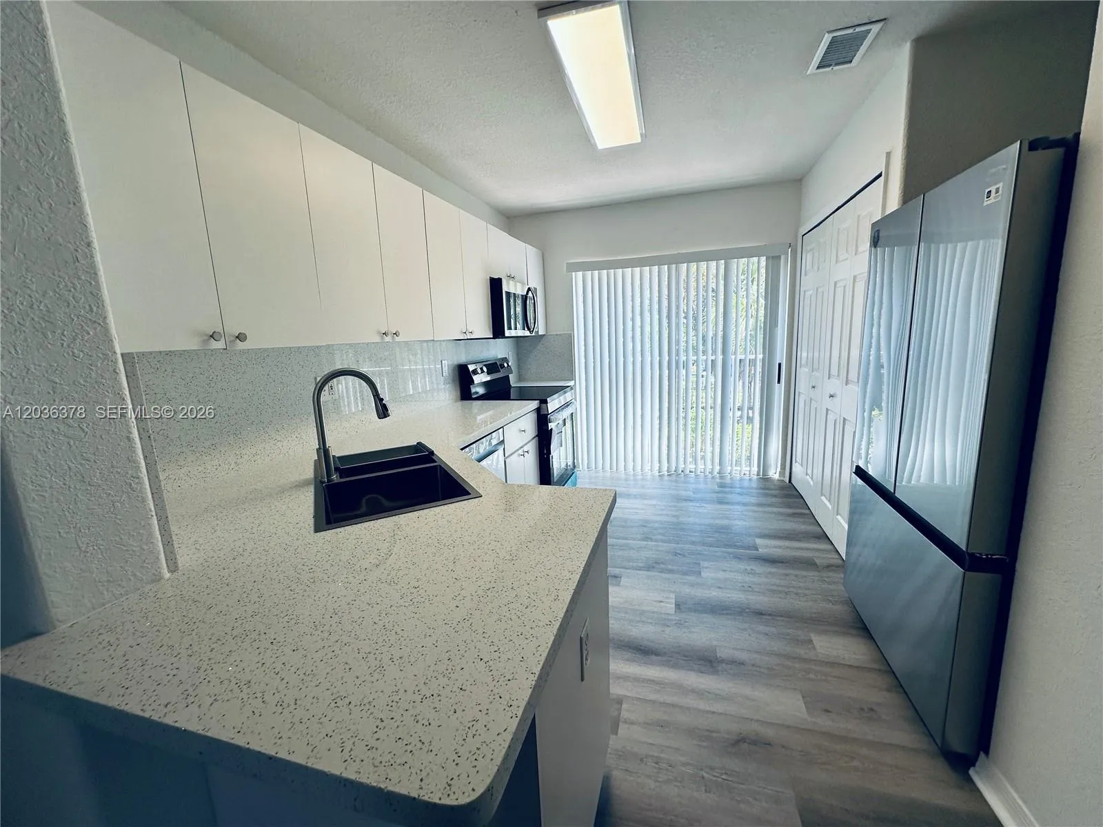 Foto de propiedad en 5705 NW 109th Avenue 50, Doral, FL 33178 Doral con MLS# 