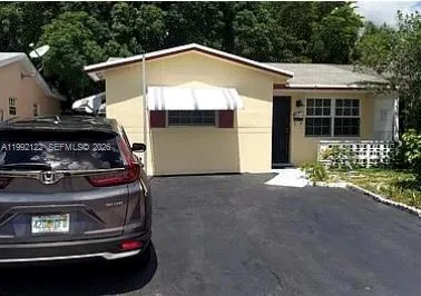 Foto de propiedad en 5705 NW 14th Street, Lauderhill, FL 33313 Lauderhill con MLS# 