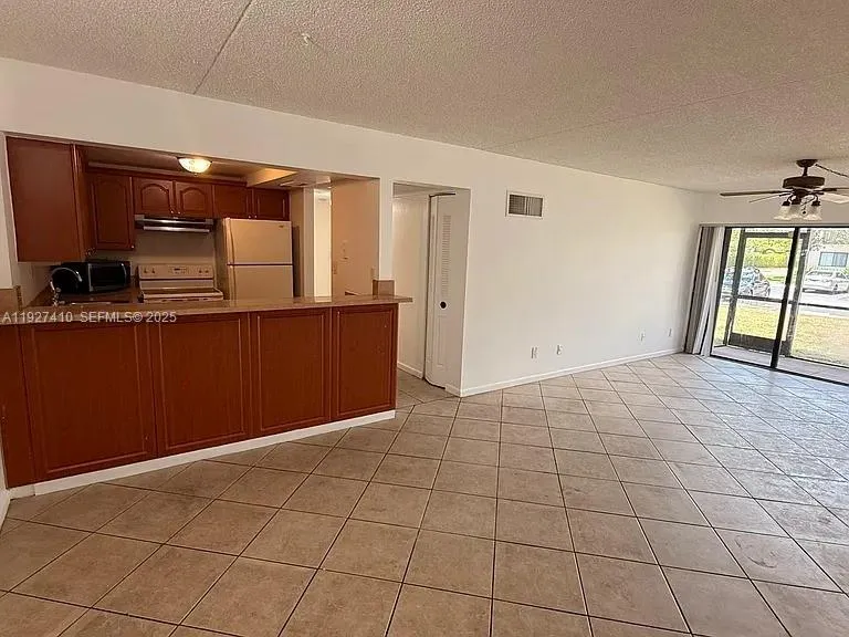 Foto de propiedad en 5855 Washington Street 91, Hollywood, FL 33023 Hollywood con MLS# 