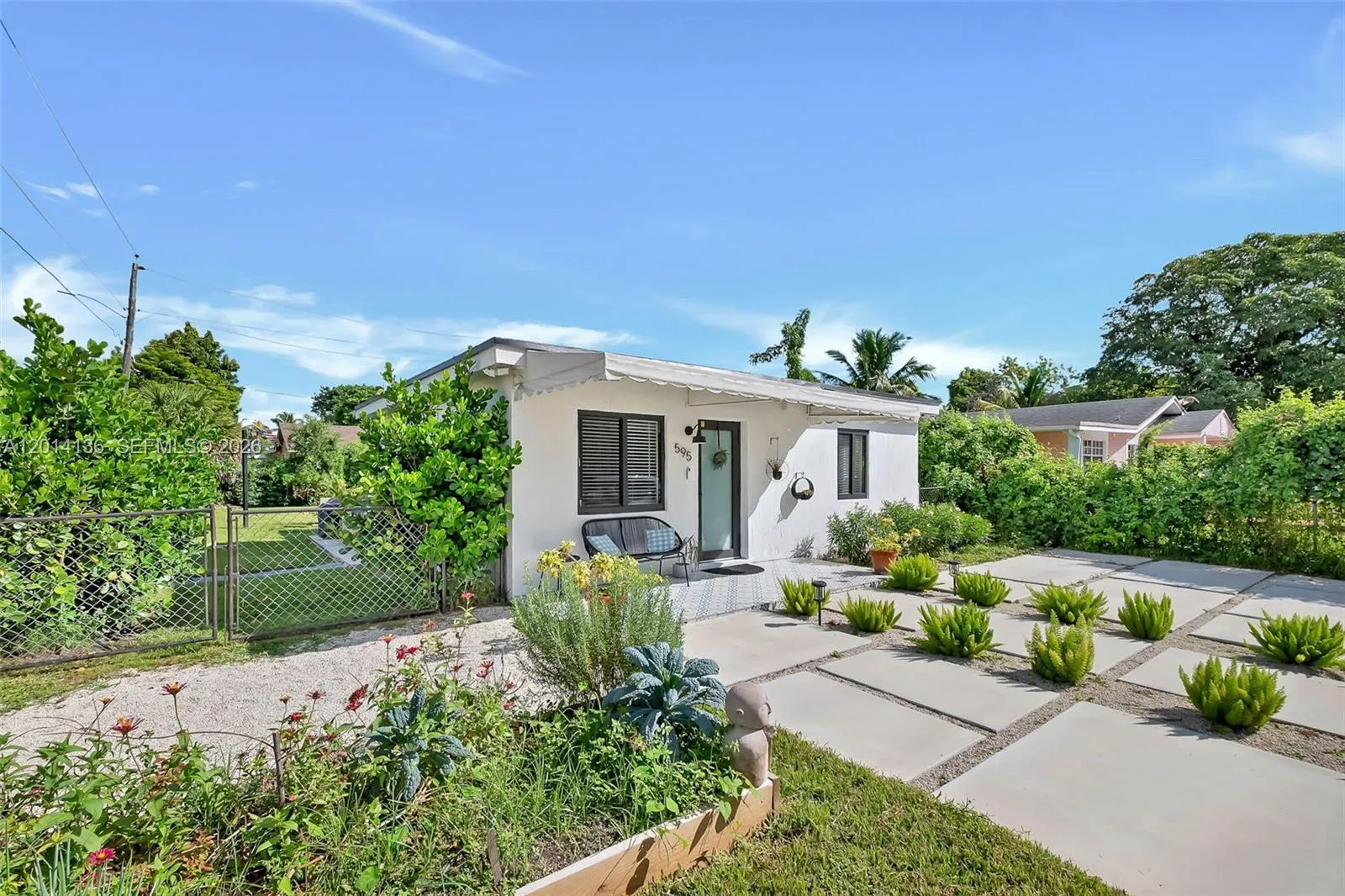 Foto de propiedad en 595 NW 101st Street, Miami, FL 33150 Miami con MLS# 