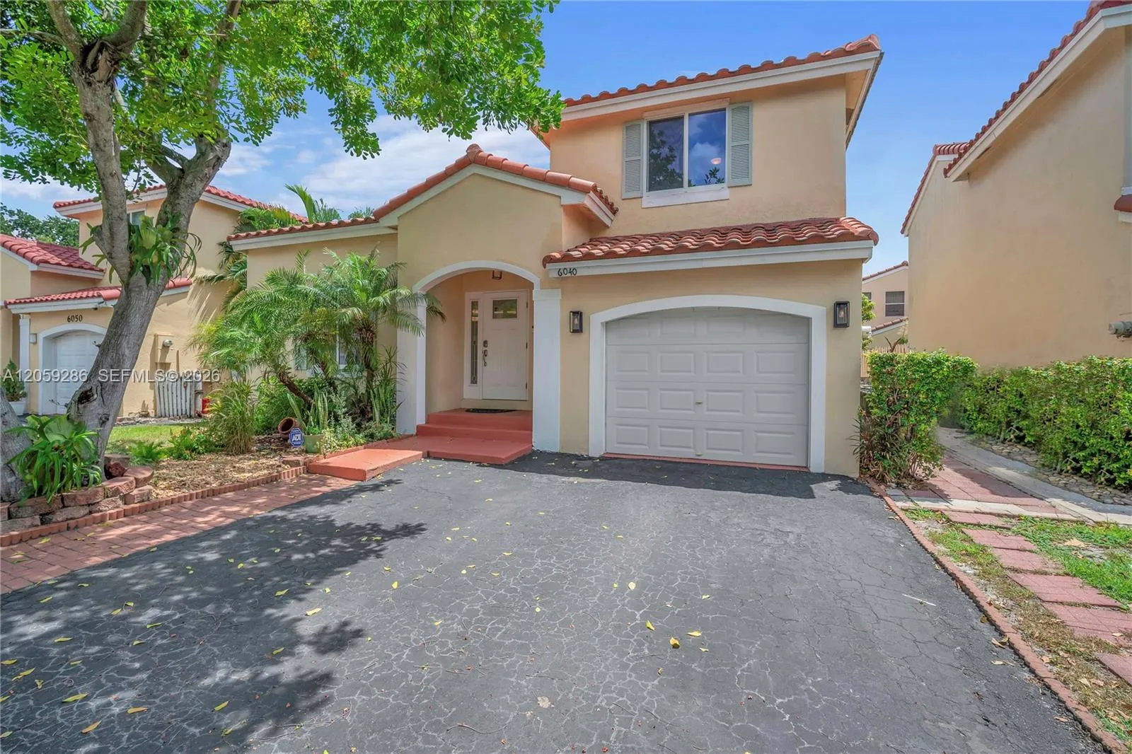 Foto de propiedad en 6040 NW 44th Lane, Coconut Creek, FL 33073 Coconut Creek con MLS# 
