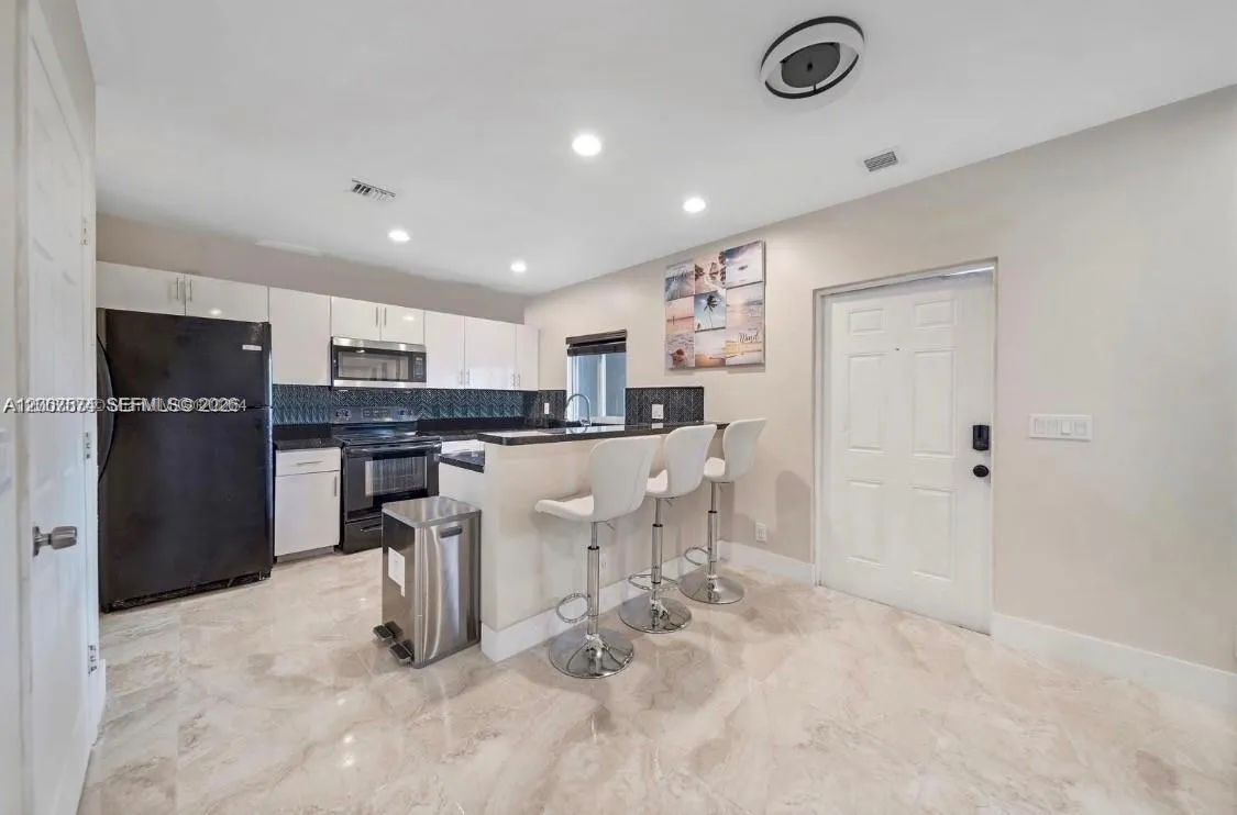 Foto de propiedad en 615 NW 10th Terrace 1, Fort Lauderdale, FL 33311 Fort Lauderdale con MLS# 