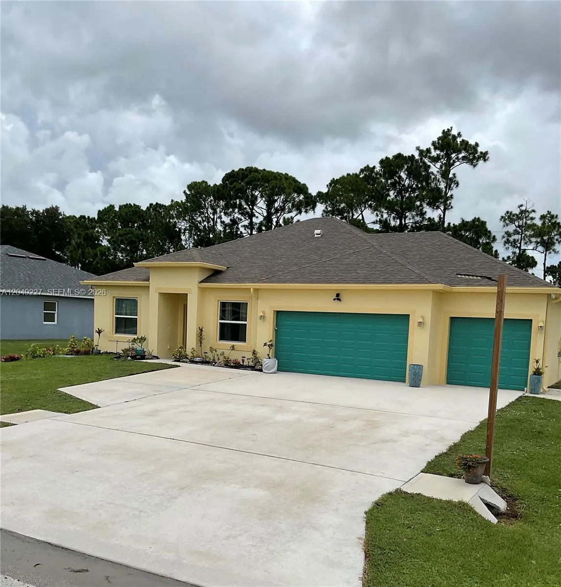 Foto de propiedad en 6157 NW Gatun Drive, Port St. Lucie, FL 34986 Port St. Lucie con MLS# 