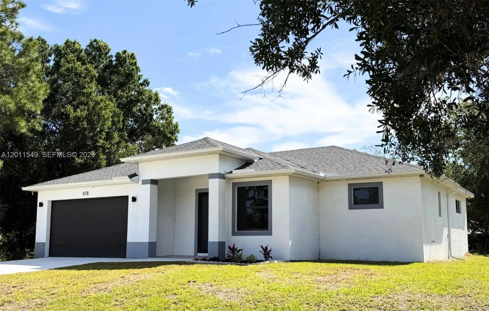 Foto de propiedad en 618 Sheldon Avenue, Lehigh Acres, FL 33936 Lehigh Acres con MLS# 