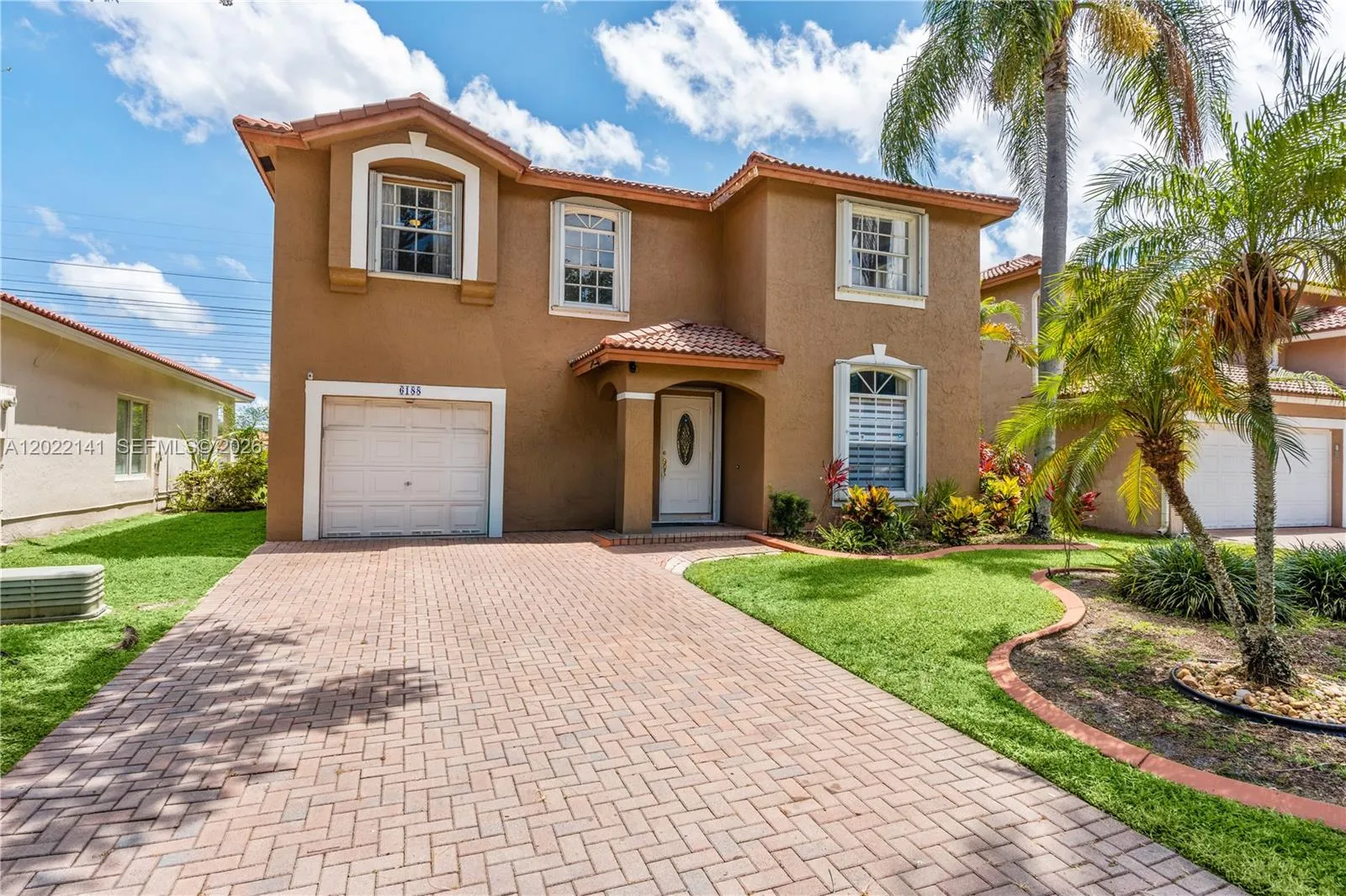 Foto de propiedad en 6188 NW 40th Street, Coral Springs, FL 33067 Coral Springs con MLS# 