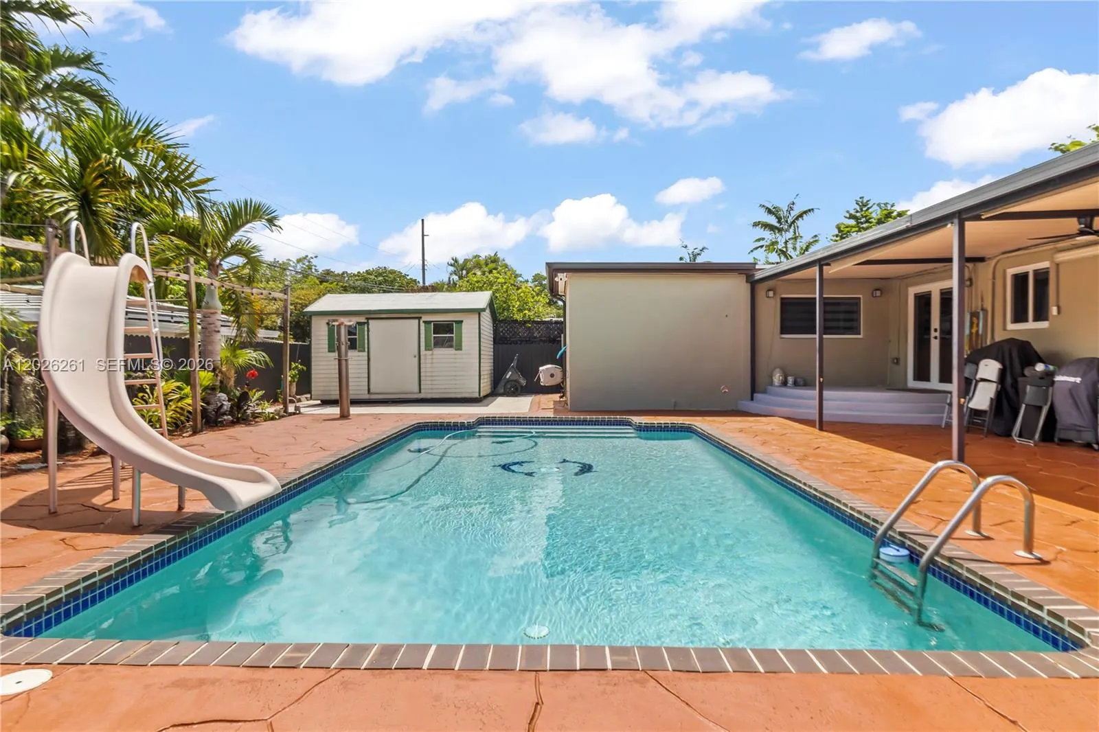 Foto de propiedad en 6250 SW 20 Terrace, Miami, FL 33155 Miami con MLS# 