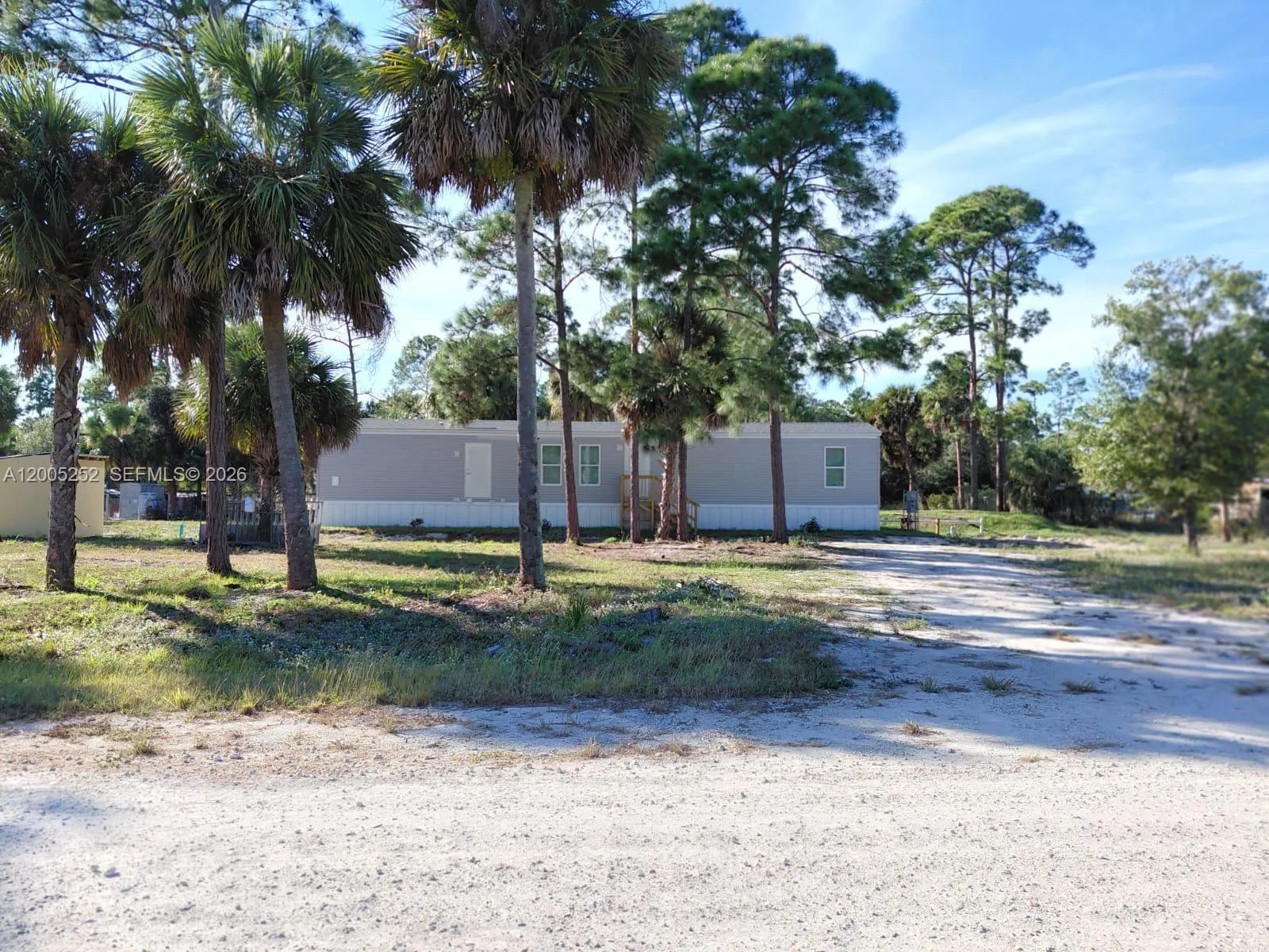 Foto de propiedad en 630 S Trebol Street, Clewiston, FL 33440 Clewiston con MLS# 