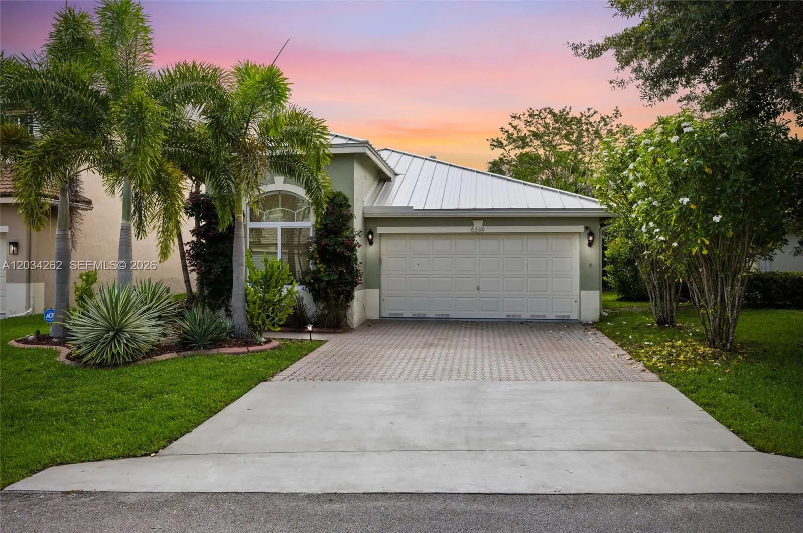 Foto de propiedad en 6530 Sandpiper Drive, Coconut Creek, FL 33073 Coconut Creek con MLS# 