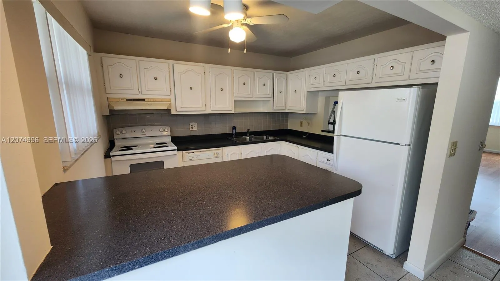 Foto de propiedad en 6550 Royal Palm Boulevard 112A, Margate, FL 33063 Margate con MLS# 
