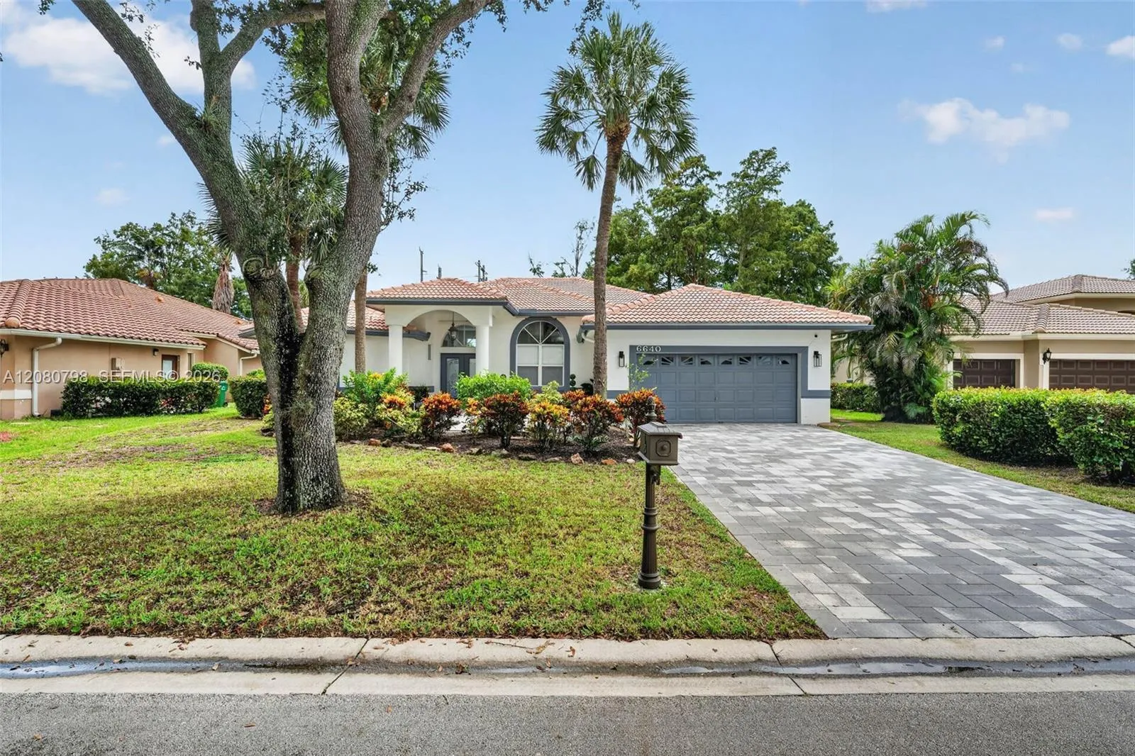 Foto de propiedad en 6640 NW 41st Street, Coral Springs, FL 33067 Coral Springs con MLS# 