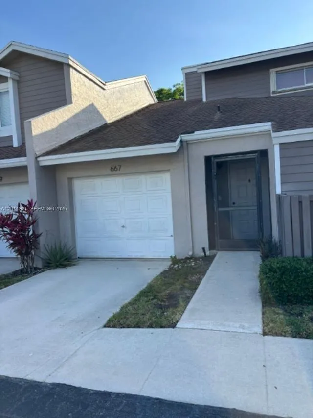 Foto de propiedad en 667 Woodgate Lane B, Sunrise, FL 33326 Sunrise con MLS# 