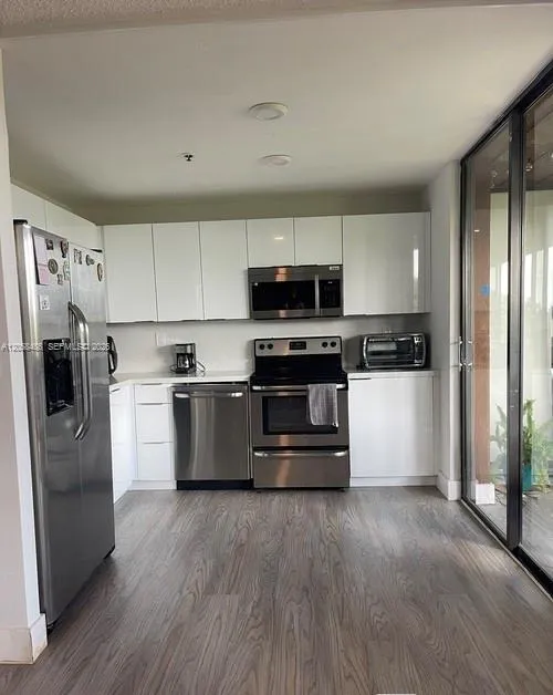 Foto de propiedad en 671 NE 195th Street 404E, Miami, FL 33179 Miami con MLS# 