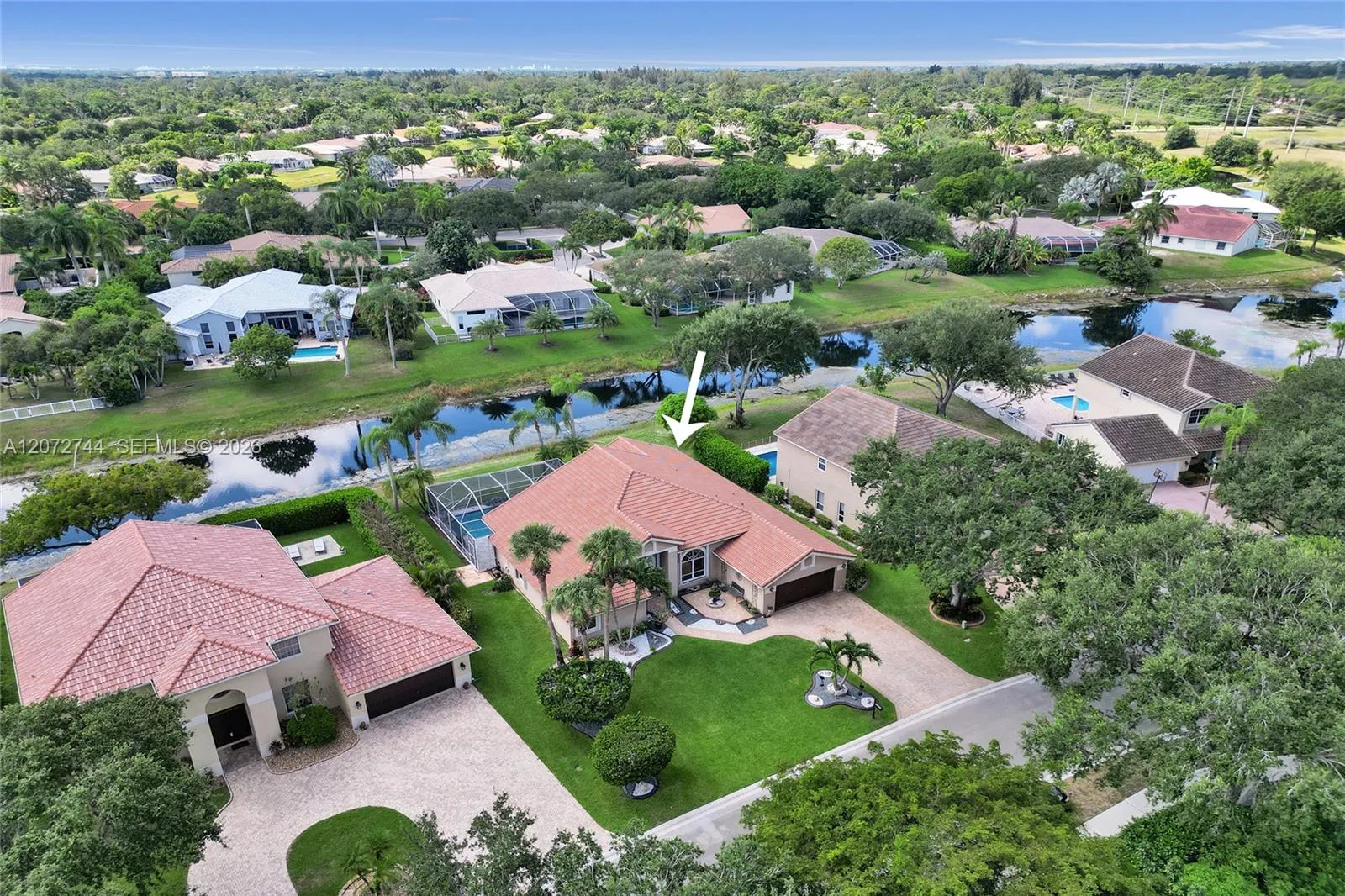 Foto de propiedad en 6810 NW 73rd Street, Parkland, FL 33067 Parkland con MLS# 