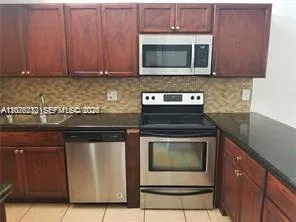 Foto de propiedad en 6979 SW 40th Street 6-O, Miramar, FL 33023 Miramar con MLS# 