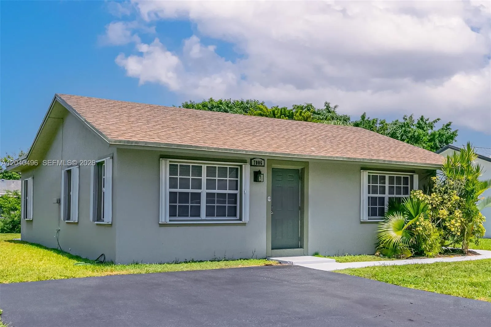 Foto de propiedad en 7006 NW 99th Way, Tamarac, FL 33321 Tamarac con MLS# 