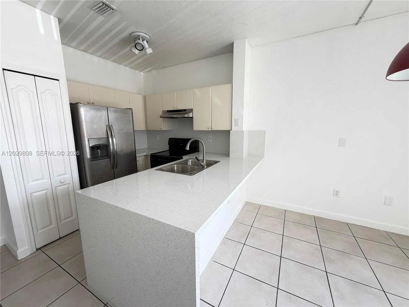 Foto de propiedad en 7080 NW 177th Street 209-13, Hialeah, FL 33015 Hialeah con MLS# 
