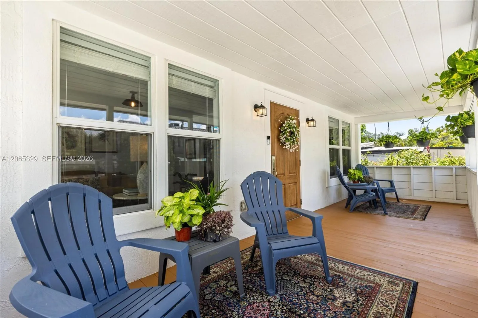 Wide, covered, shaded, and made for actually sitting outside — not just looking pretty from the street.