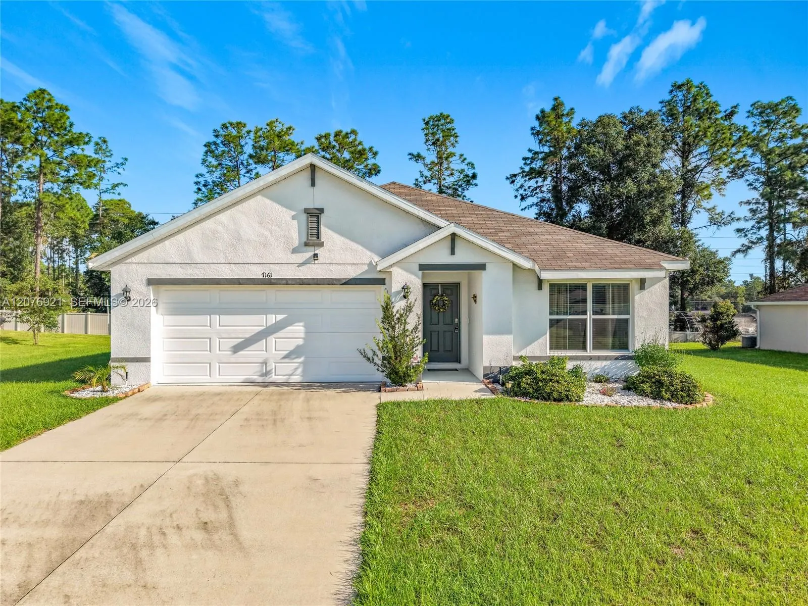Foto de propiedad en 7161 SW 135th Place, Ocala, FL 34473 Ocala con MLS# 