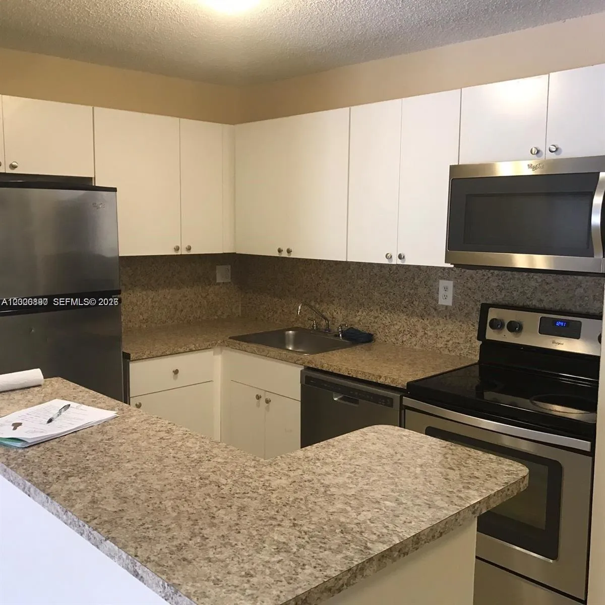 Foto de propiedad en 7200 NW 179th Street 302, Hialeah, FL 33015 Hialeah con MLS# 