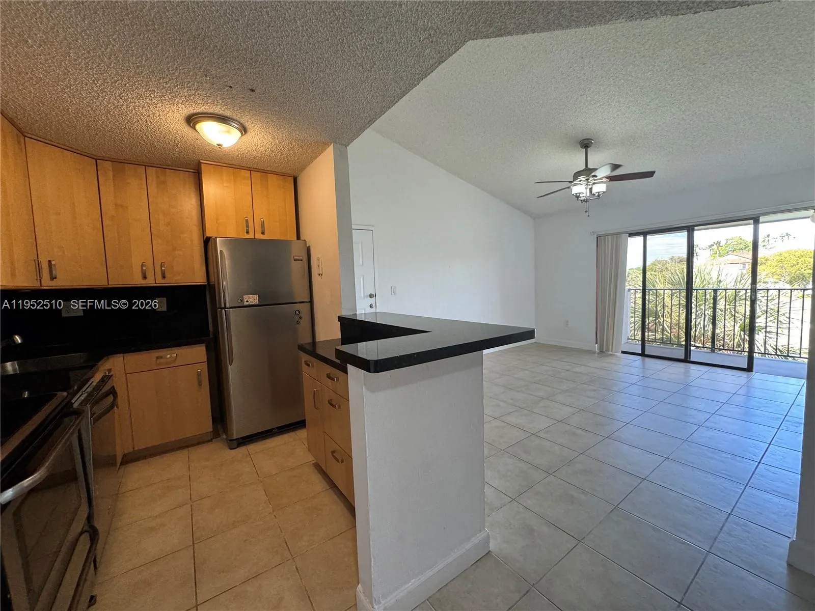 Foto de propiedad en 7235 NW 179th Street 311, Hialeah, FL 33015 Hialeah con MLS# 