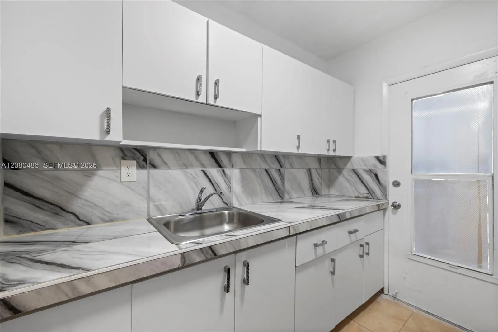 Foto de propiedad en 7271 Gary Avenue 2, Miami Beach, FL 33141 Miami Beach con MLS# 