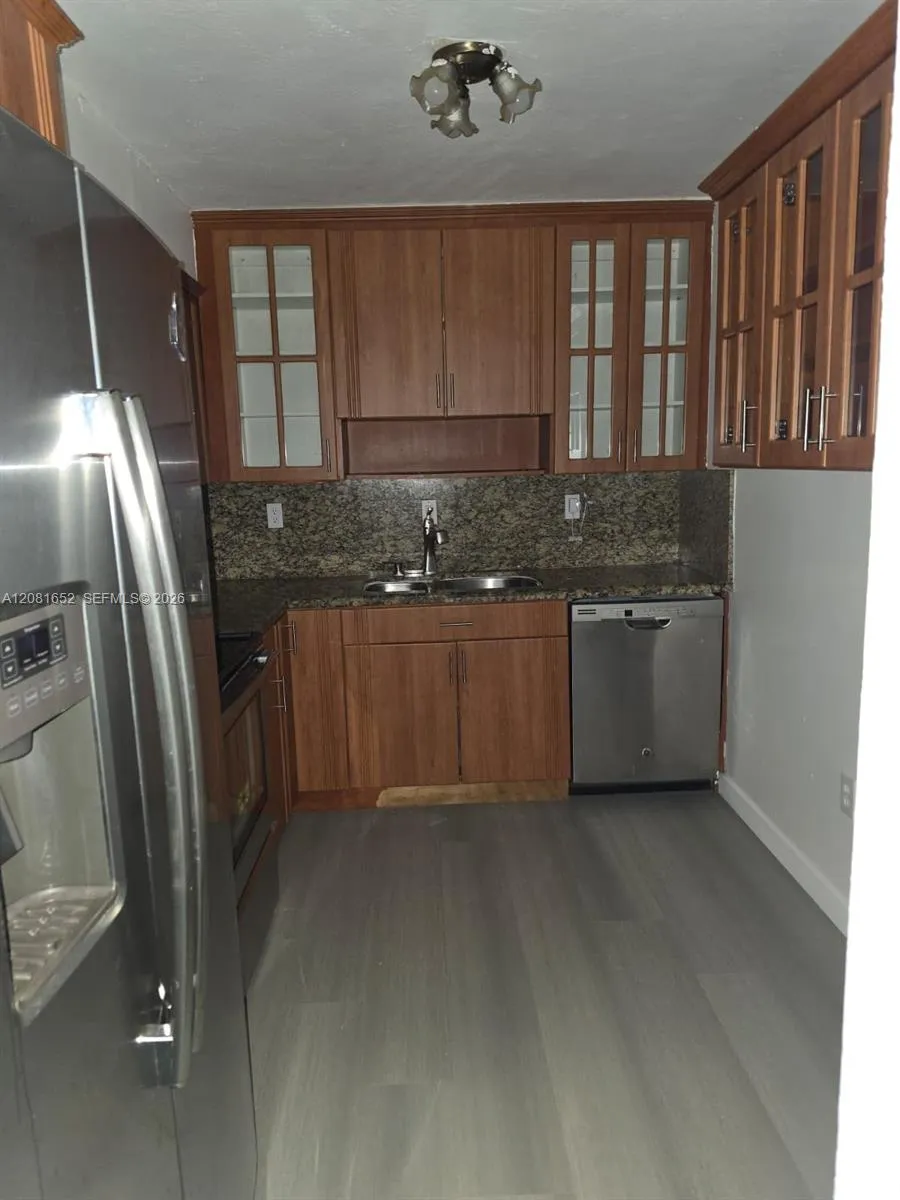 Foto de propiedad en 7300 NW 17th Street 408, Plantation, FL 33313 Plantation con MLS# 