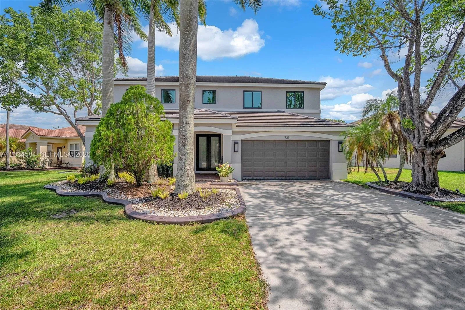 Foto de propiedad en 731 Tulip Circle, Weston, FL 33327 Weston con MLS# 