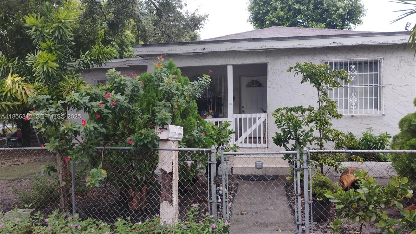 Foto de propiedad en 7312 NW 17th Court, Miami, FL 33147 Miami con MLS# 
