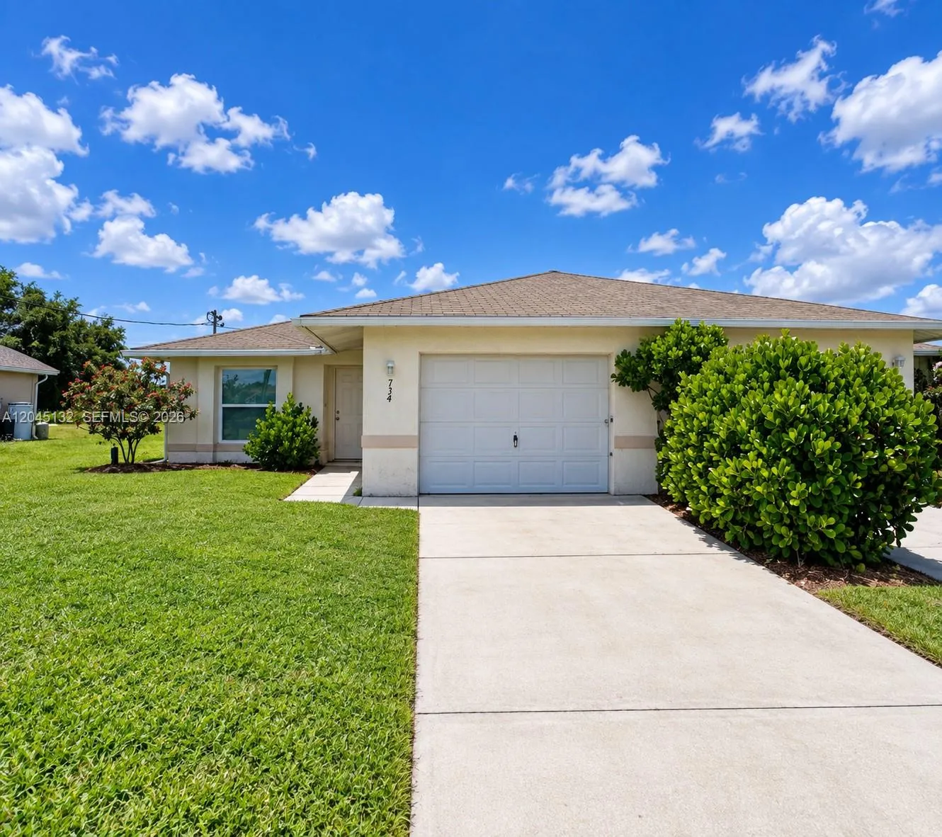 Foto de propiedad en 732 Ichabod Avenue 732, Lehigh Acres, FL 33973 Lehigh Acres con MLS# 
