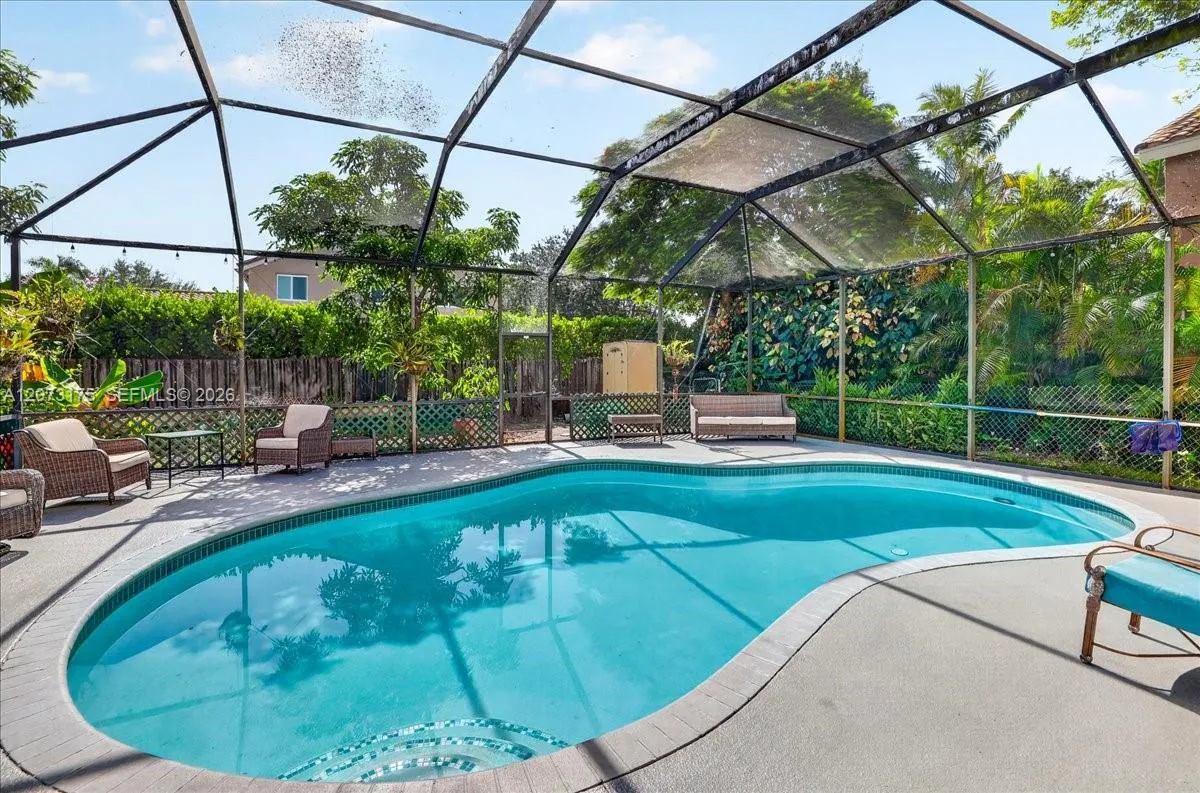 Foto de propiedad en 7320 NW 68th Way, Parkland, FL 33067 Parkland con MLS# 