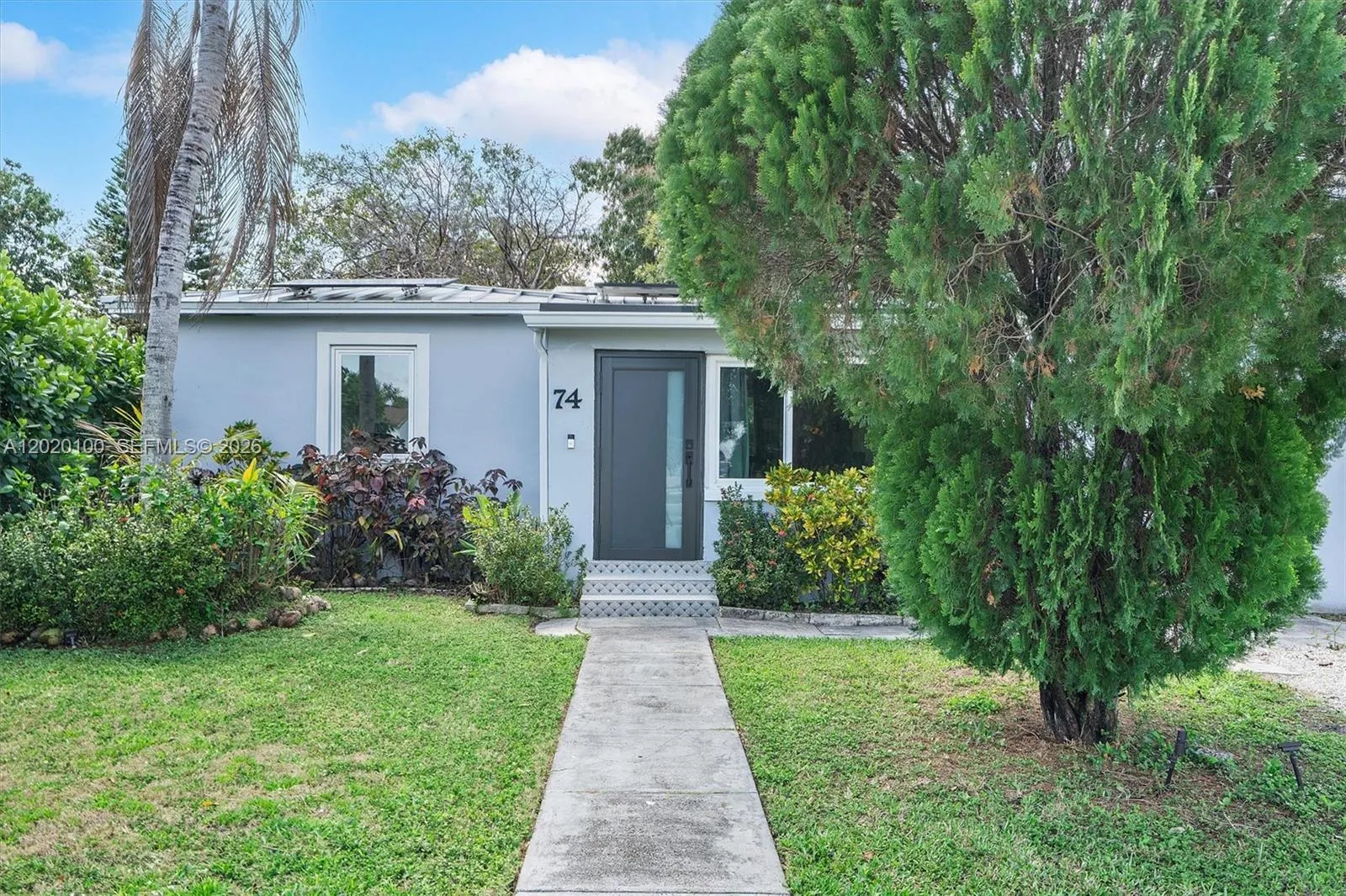 Foto de propiedad en 74 NW 117th Street, Miami, FL 33168 Miami con MLS# 