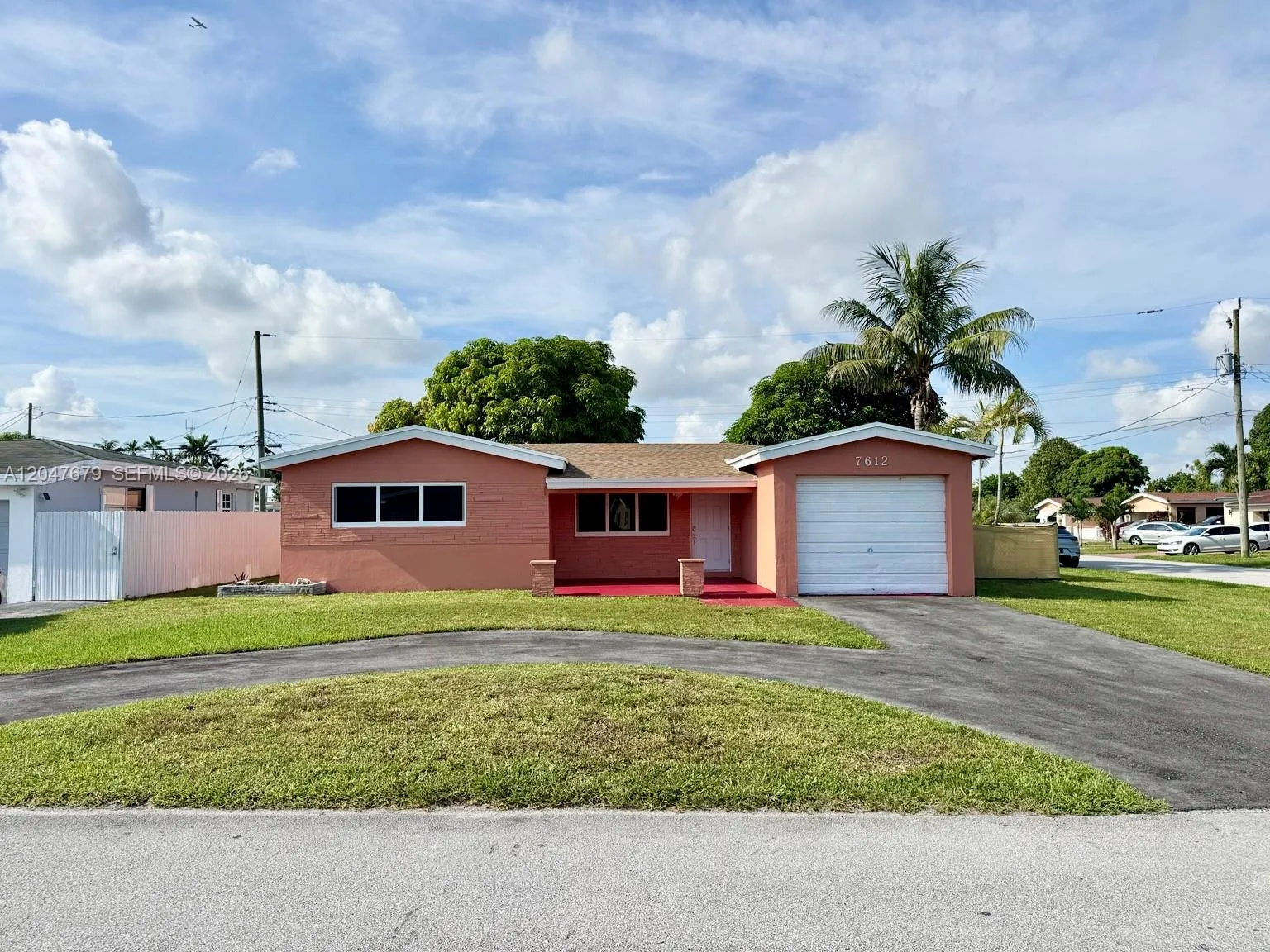 Foto de propiedad en 7612 Plantation Boulevard, Miramar, FL 33023 Miramar con MLS# 