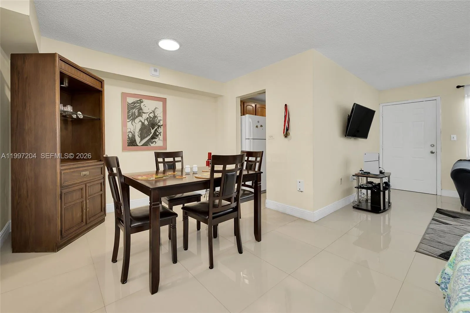 Foto de propiedad en 7620 Carlyle Avenue 204, Miami Beach, FL 33141 Miami Beach con MLS# 