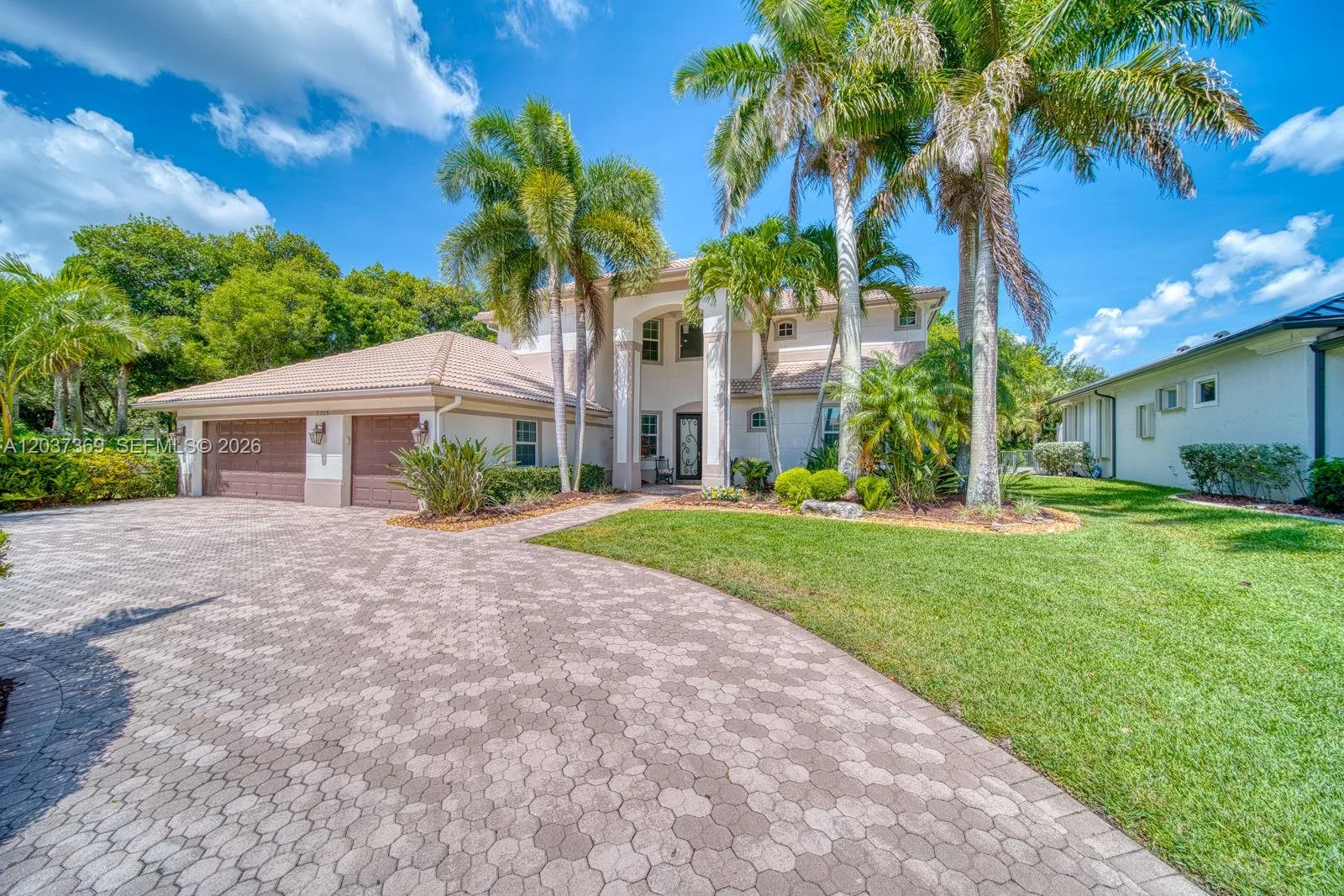 Foto de propiedad en 7725 NW 128th Avenue, Parkland, FL 33076 Parkland con MLS# 