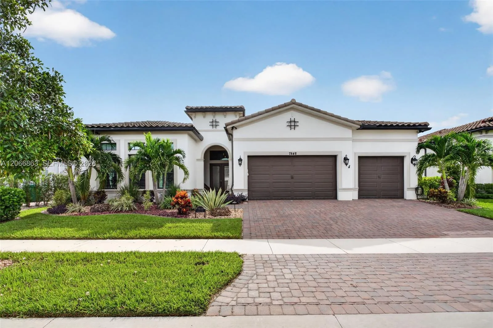Foto de propiedad en 7848 Liberty Way, Parkland, FL 33067 Parkland con MLS# 