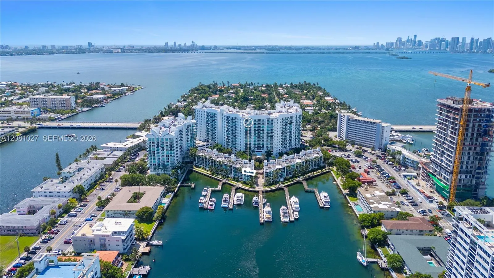 Marina front penthouse corner unit! Flyover view of building from the north.