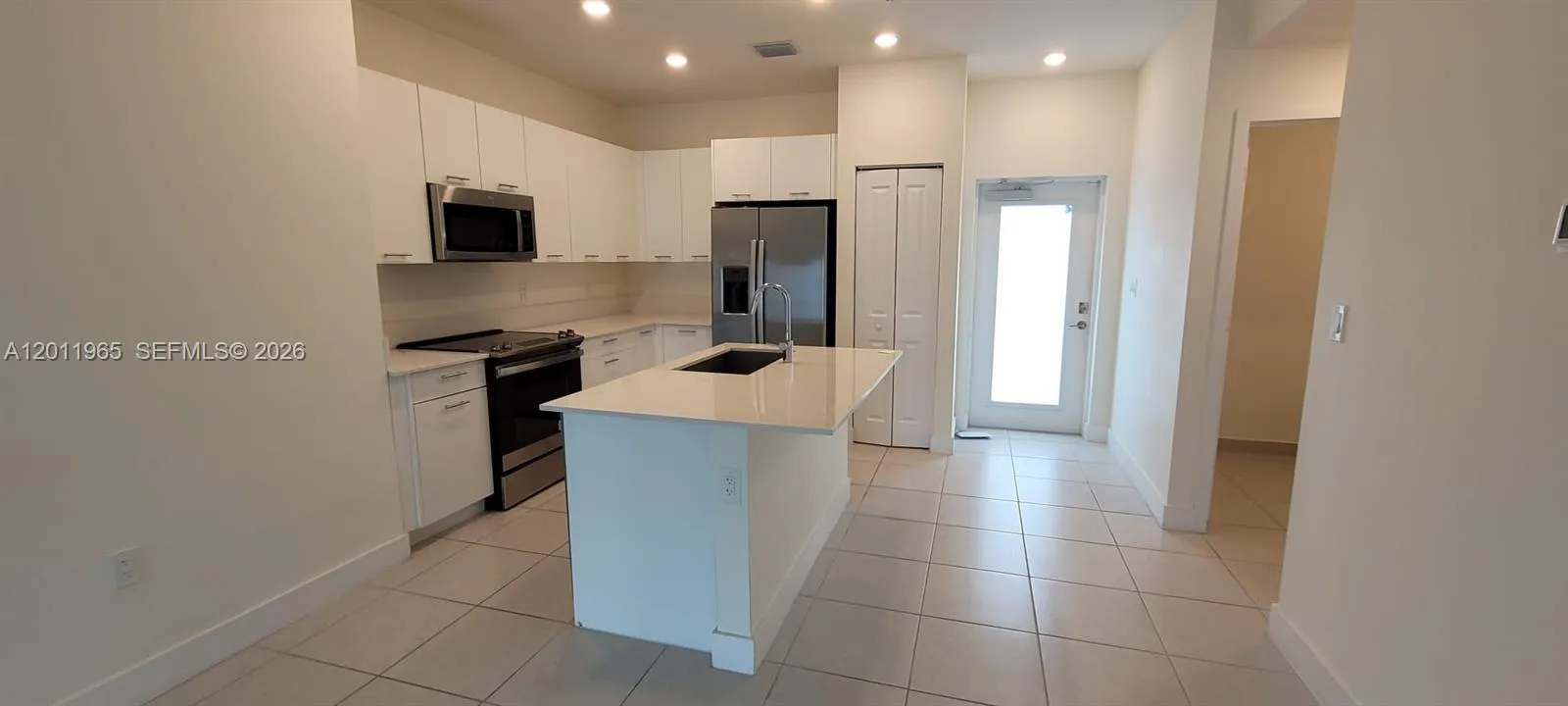 Foto de propiedad en 8001 NW 41st Street F-405, Doral, FL 33166 Doral con MLS# 