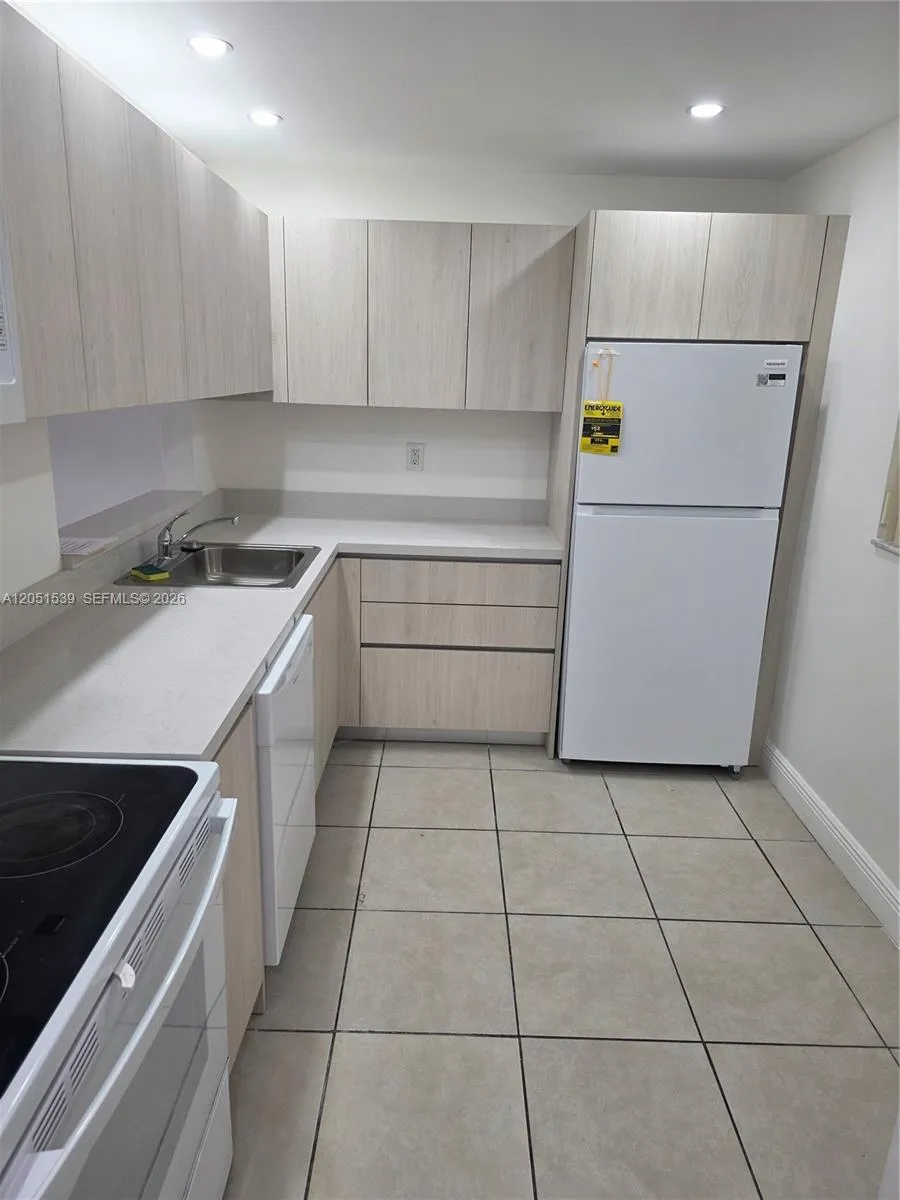 TOTALLY REMODELED WITH NEW CABIBETS , QUARTZ COUNTERTOPS