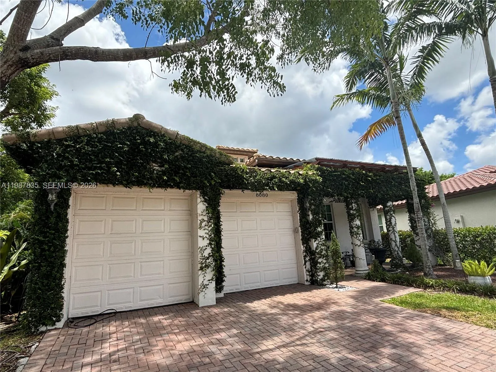 Foto de propiedad en 8080 NW 126th Terrace, Parkland, FL 33076 Parkland con MLS# 