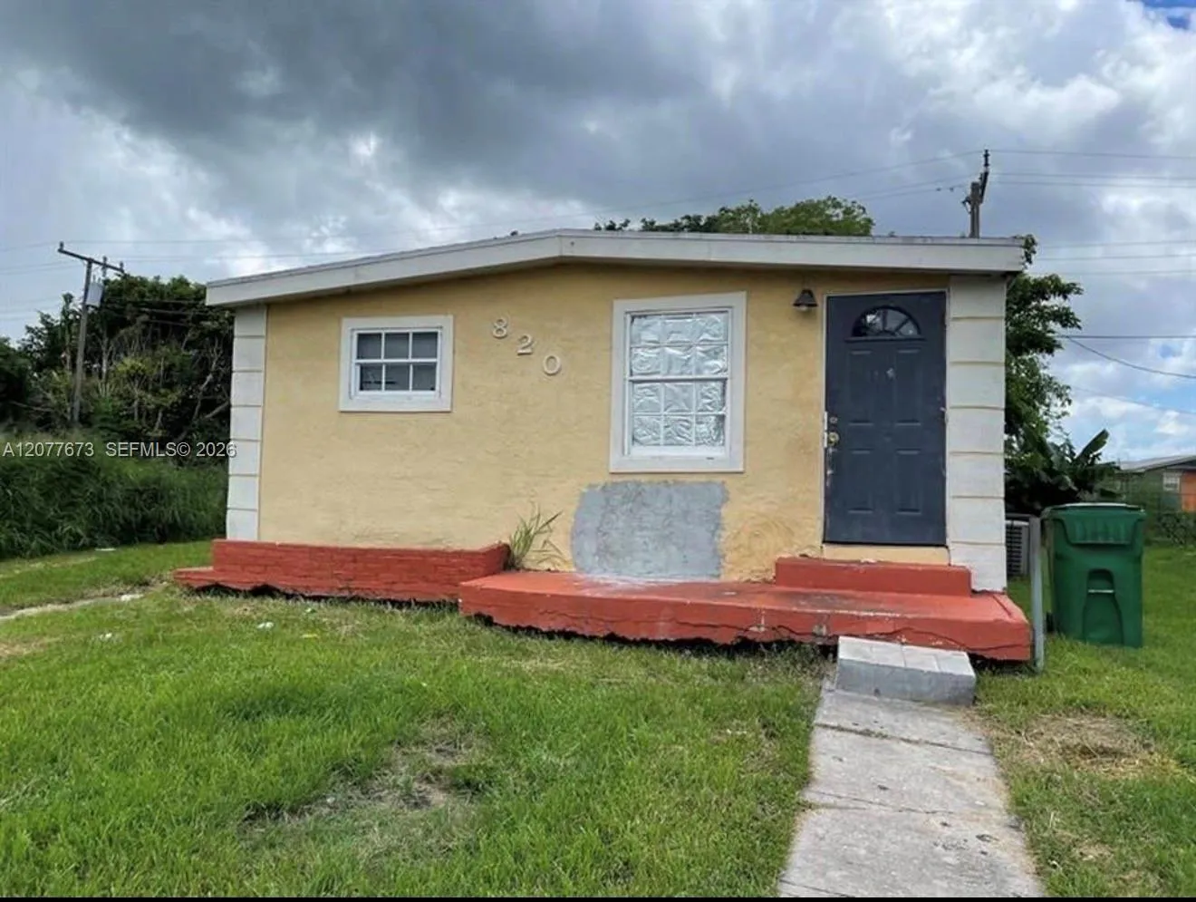 Foto de propiedad en 820 Rickey Jackson Boulevard, Pahokee, FL 33476 Pahokee con MLS# 