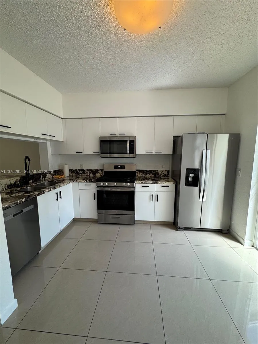 Foto de propiedad en 8207 San Carlos Circle 8207, Tamarac, FL 33321 Tamarac con MLS# 
