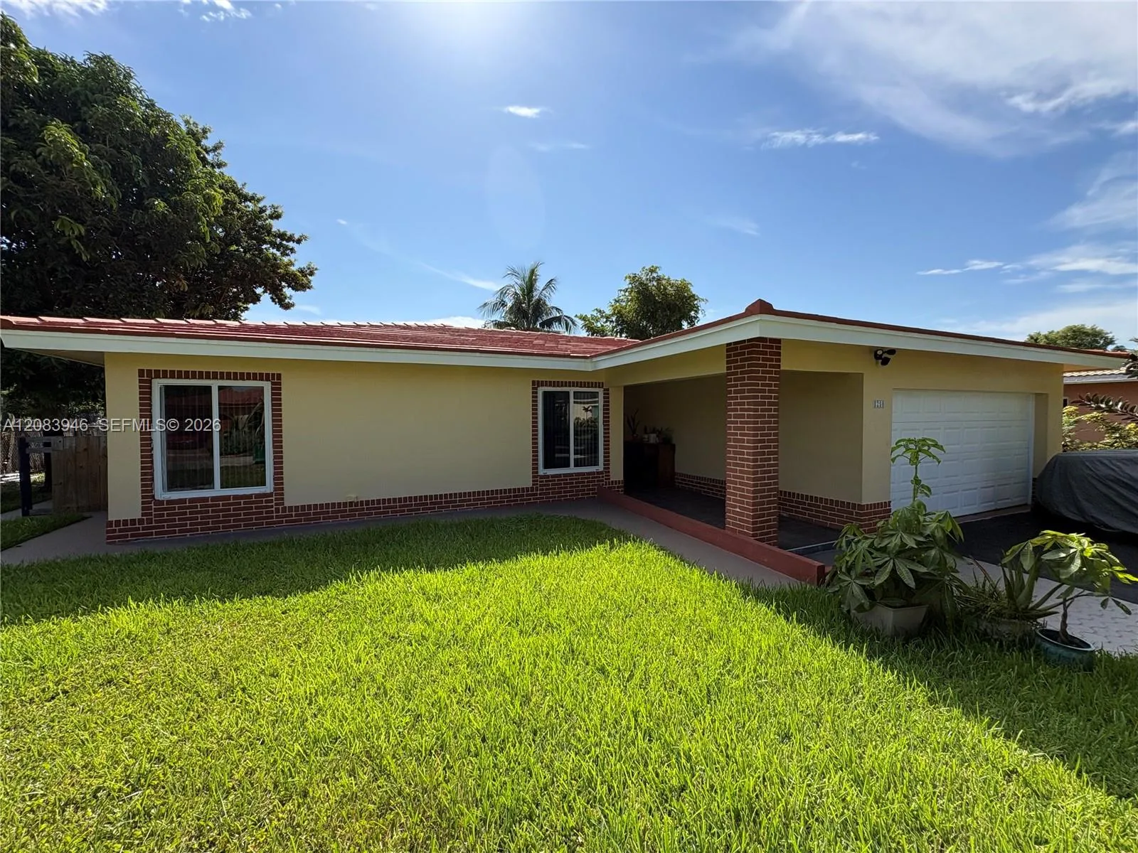 Foto de propiedad en 8250 NW 66th Terrace, Tamarac, FL 33321 Tamarac con MLS# 