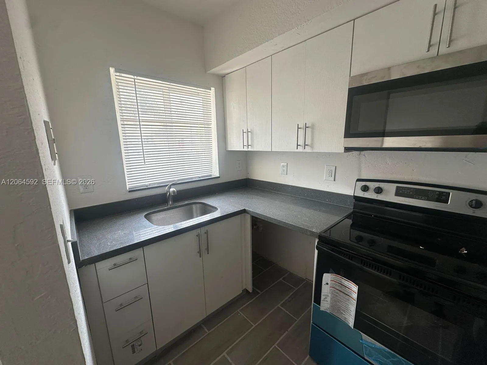 Foto de propiedad en 8325 NW 5th Avenue 8325, Miami, FL 33150 Miami con MLS# 