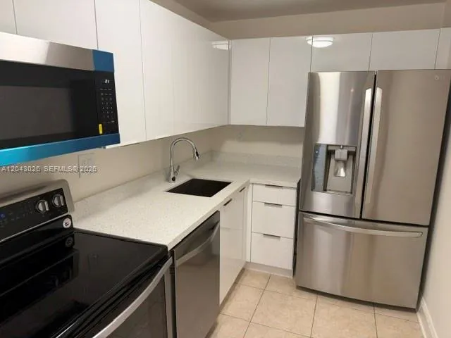 Foto de propiedad en 8405 NW 8th Street 303, Miami, FL 33126 Miami con MLS# 